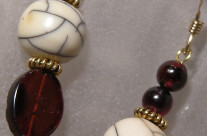Garnet and faux ivory earrings