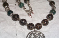Bloodstone and jade Ouroboros necklace
