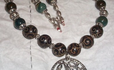 Bloodstone and jade Ouroboros necklace
